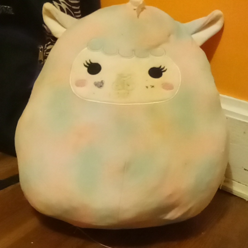 A cute pink and white tie dye llama squishmallow